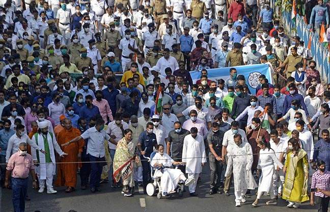 Kolkata: CPI(M) West Bengal Chief Minister and TMC supremo Mamata Banerjee along with other leaders and activists took part in a rally during Nandigram Diwas ahead of State Assembly election in Kolkata on Sunday 14th March, 2021.(Photo: IANS/Kuntal Chakra