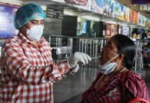 New Delhi: Health worker collect swab sample for Covid-19 testing at New Delhi Railway Station in new Delhi on Friday April 02, 2021.(Photo:Wasim Sarvar/IANS)