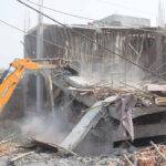 New Delhi: A bulldozer removes an illegal building at Madanpur Khadar during an anti-encroachment drive by MCD, in New Delhi on Thursday, May 12, 2022. (Photo: IANS)