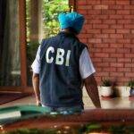 New Delhi : A Central Bureau of Investigation (CBI) official during a raid at the residence of Delhi Deputy Chief Minister Manish Sisodia in connection with Delhi Excise Policy case, in New Delhi on Friday, August 19, 2022. (Photo: IANS/Wasim Sarwar)