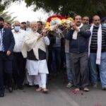 Ahmedabad: Prime Minister Narendra Modi carrying mortal  remains of his mother Heeraben’s body  to sector 30’s crematorium for last rites in Ahmedabad  on Friday  December  30,2022.(PHOTO: IANS/Siddharaj Solanki)