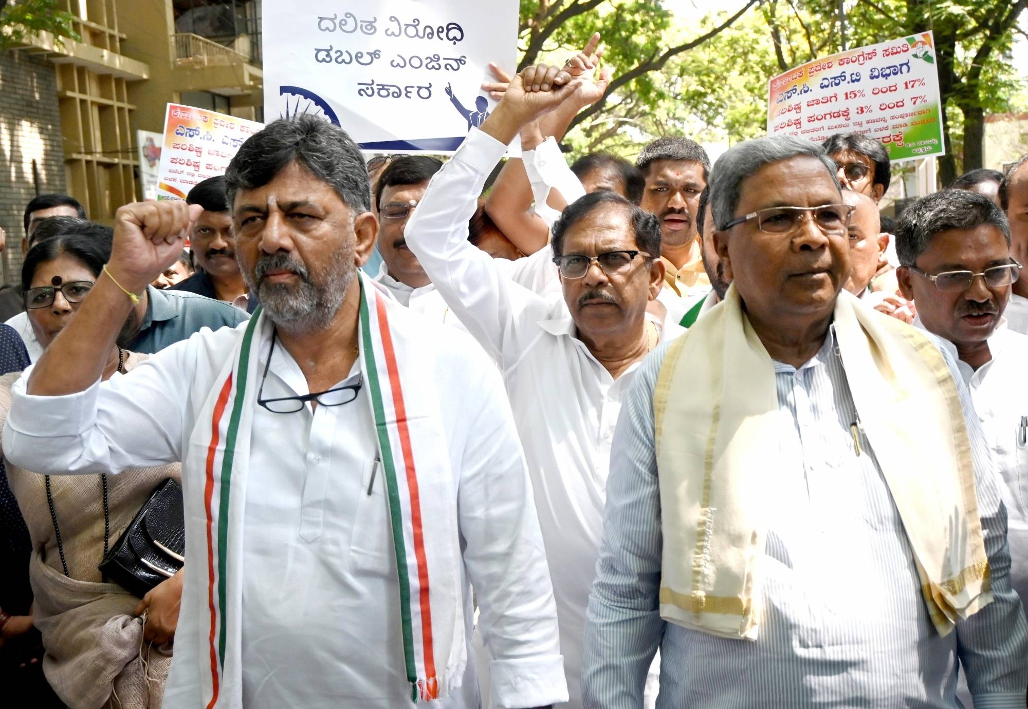 Bengaluru:KPCC President DK Shivakumar, Former CM Siddaramaiah with Congress leaders condemn the anti-schedule policy of the BJP government, in Bengaluru on Friday 24th March 2023.(PHOTO:IANS)
