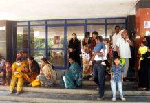 Patients waiting outside jayanagar public general hospital, with no response from the staff