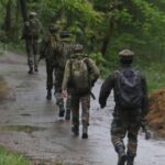 Baramulla :Army soldiers moving towards ongoing encounter site at Malwaa villages of Baramulla district in Jammu and Kashmir on Thursday April 21,2022.(Photo: Nisar Malik /IANS)