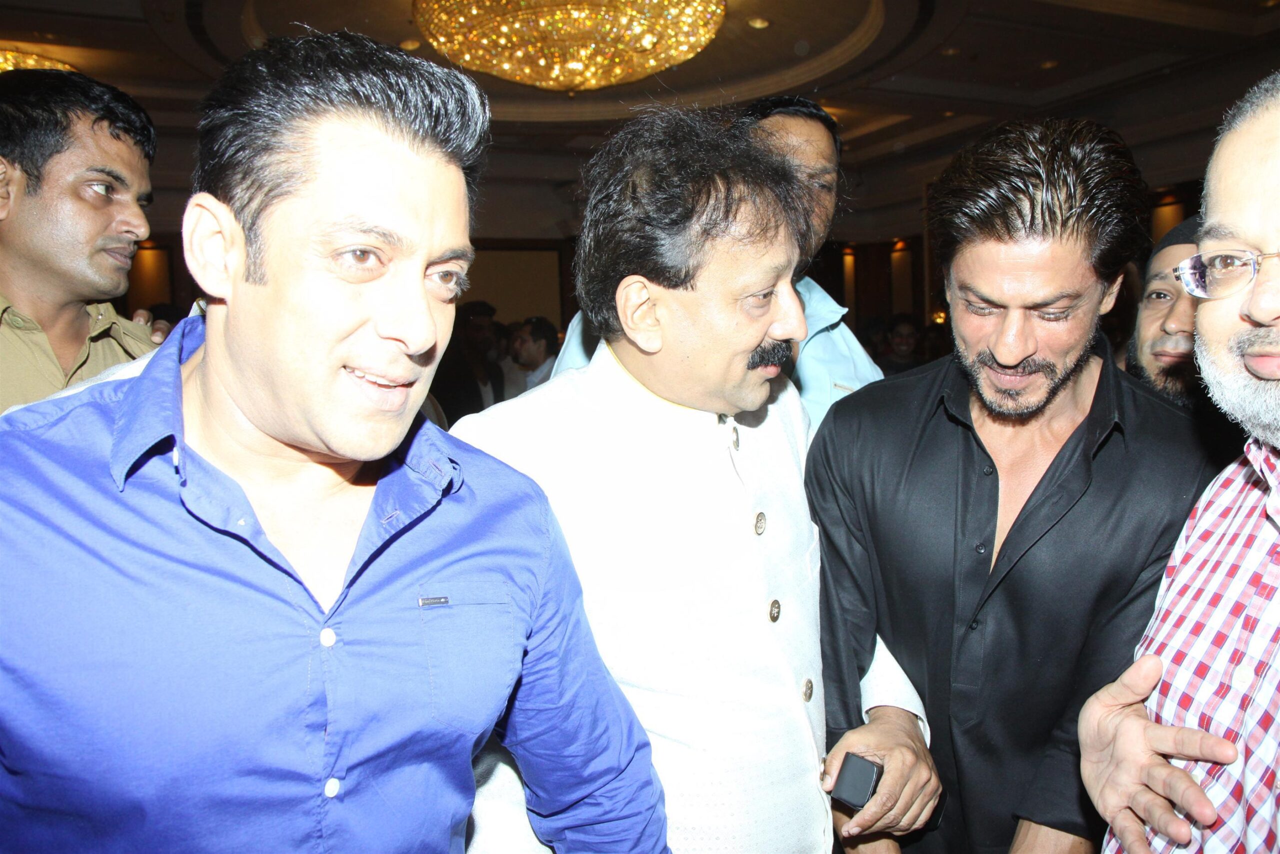 Actors Shahrukh Khan and Salman Khan during the Iftar Party hosted by Baba Siddique in Mumbai on July 6, 2014. (Photo: IANS)